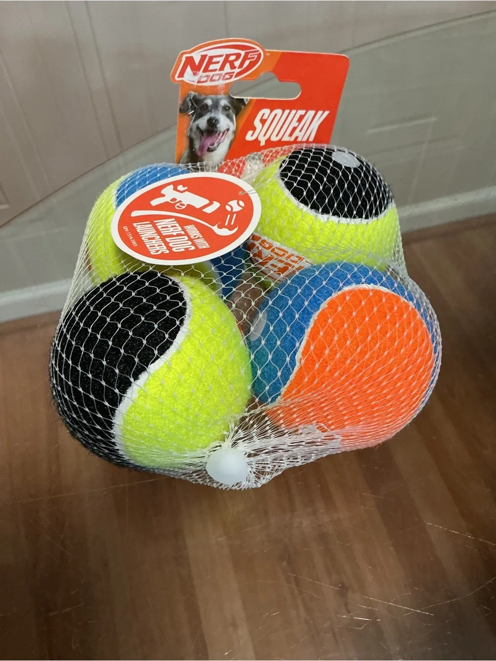 Durable Nerf Dog Squeak Tennis Balls 4 Pack Dog Toy Assorted Colors Interactive
